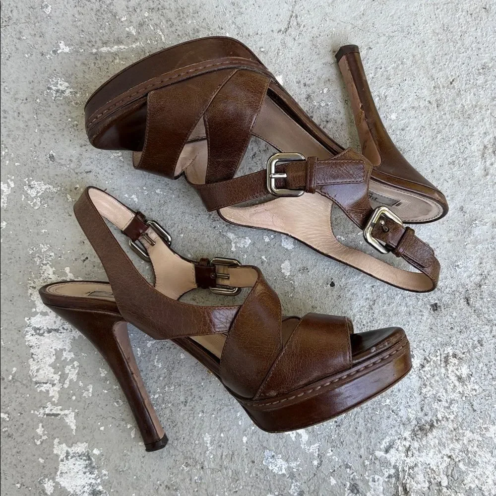 Prada crisscross open toe platforms